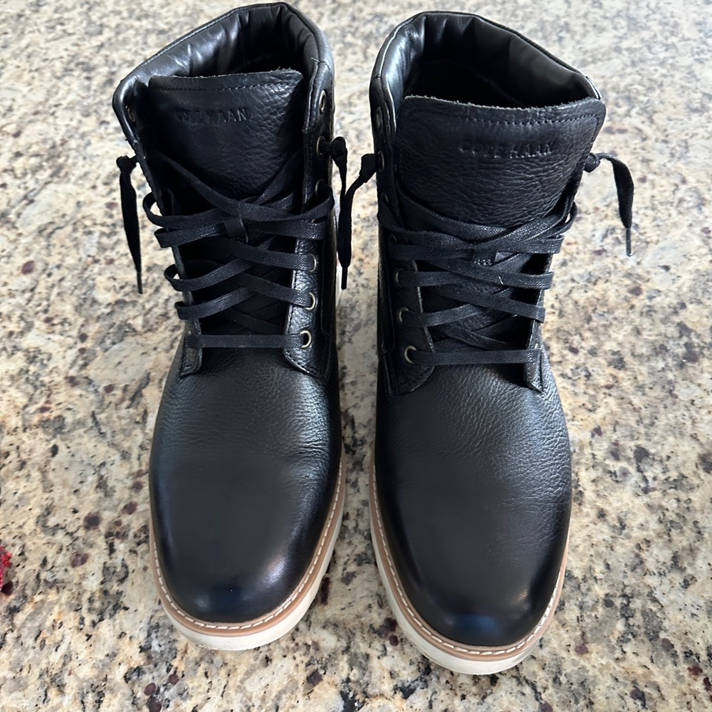 Worn men’s Cole Haan 11.5M black boots.
